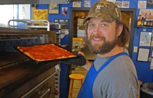 Square Pizza owner Tate Moore interpreted his initial rejection as a Double Decker food vendor as implying he isn't 