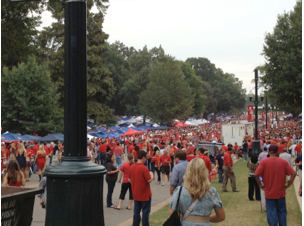 The crowd of Ole Miss and Texas fans making their way through the Grove prior to kickoff on September 24, 2012. Photo by Shannon deLoach.