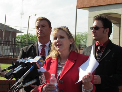 Left to Right: Assistant U.S. Attorney Chad Lamar, Curtis Defense Attorney Christi McCoy and Paul Kevin Curtis at a press conference outside the federal courthouse following the dismissal of charges against  Curtis on Tuesday