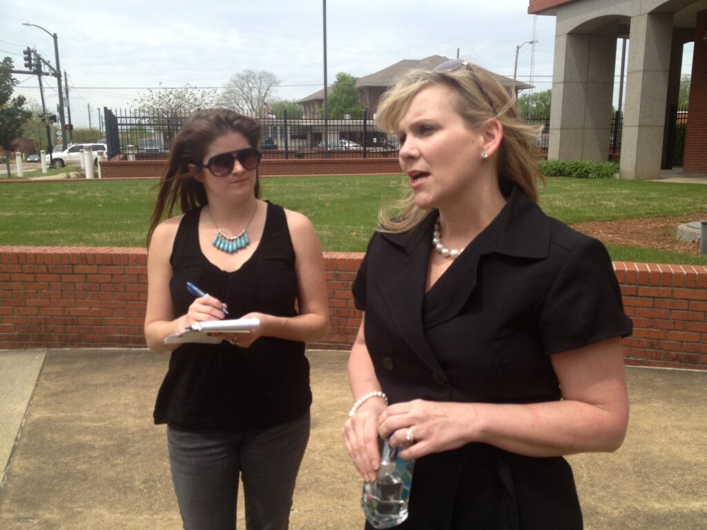 HottyToddy.com reporter Hillary Houston interviews Curtis defense attorney Christi McCoy / Photo By Ed meek