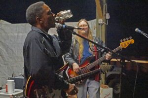 Duwayne Burnside refuels with a nip last October at Betty Davis’s Ponderosa, the site of the North Mississippi Hill Country Picnic this weekend. Photo: John Allison.