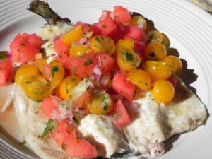 Grilled trout with summer salsa.