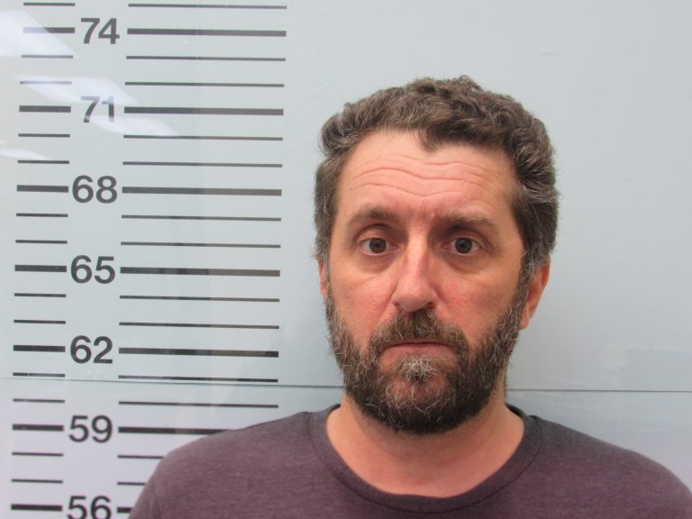 Man Arrested After Neighbor Finds Camera in Her Bedroom Wall