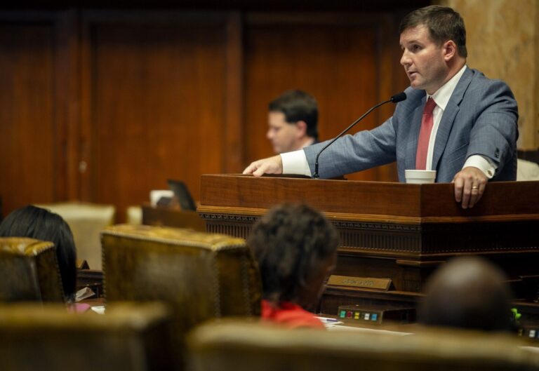 Legislator at podium