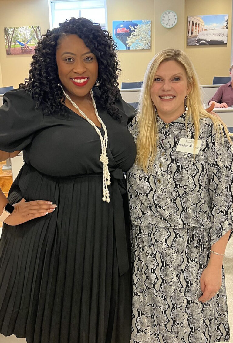 Women Business Owners and University Leaders Address Group