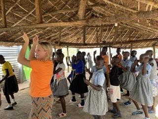 OHS Senior and Chargerette Captain Teaches Dance to Children in Uganda￼
