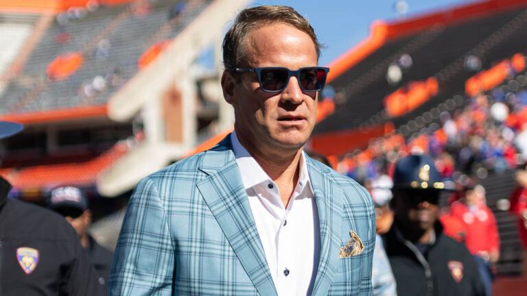 Ole Miss Rebels coach Lane Kiffin walks off the field before a game against the Florida Gators