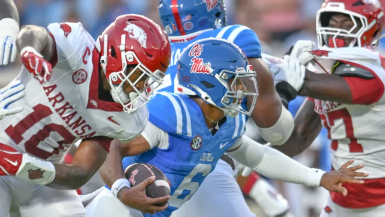Ole Miss Rebels quarterback Trinidad Chambliss runs the ball against the Arkansas Razorbacks