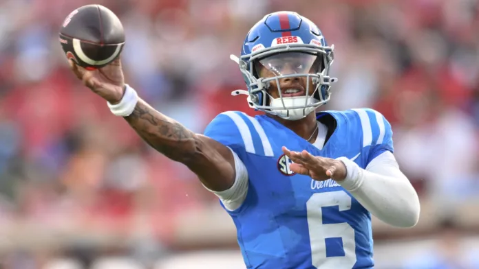 Ole Miss Rebels quarterback Trinidad Chambliss throws a pass against the Arkansas Razorbacks