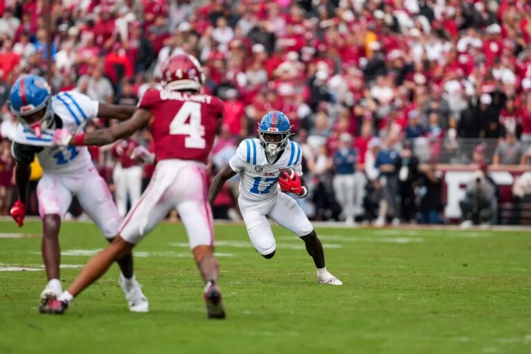Ole Miss wide receiver Winston Watkins runs after making a catch against Oklahoma on Saturday.