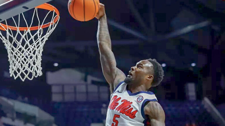 Ole Miss Rebels guard Hobert Grayson IV goes to the basket for a dunk against Southeastern Louisiana
