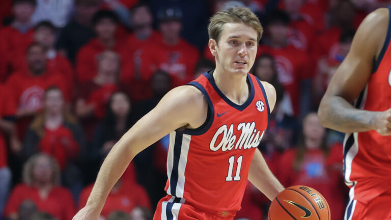 Ole Miss Rebels guard Travis Perry bringing the ball up court against the Memphis Tigers