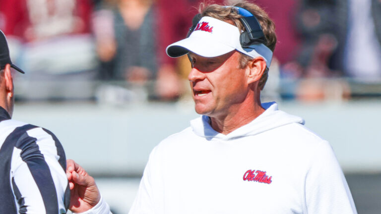 Ole Miss Rebels coach Lane Kiffin on the sidelines against the Mississippi State Bulldogs