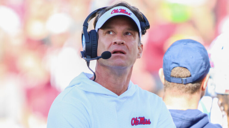Ole Miss Rebels coach Lane Kiffin on the sidelines against the Mississippi State Bulldogs