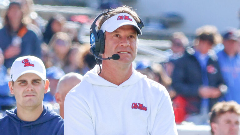 Ole Miss Rebels coach Lane Kiffin on the sidelines against the Mississippi State Bulldogs