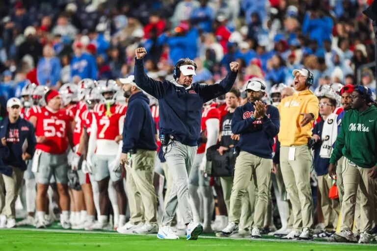 Ole Miss coach Lane Kiffin celebrates during the Rebels' 30-14 victory against South Carolina on Saturday.