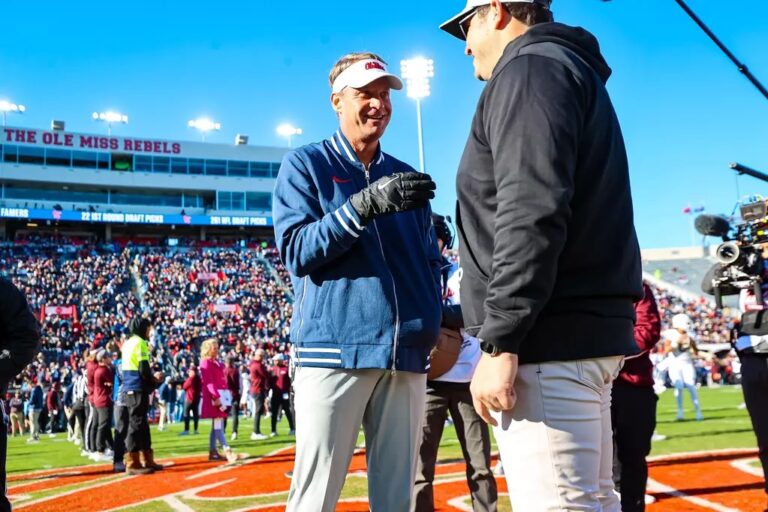 Ole Miss coach Lane Kiffin and Mississippi State coach Jeff Lebby talk before the 2024 Egg Bowl.