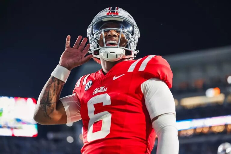 Ole Miss quarterback Trinidad Chambliss reacts after his touchdown run against South Carolina.