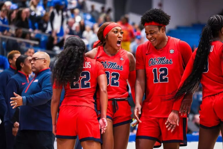 Ole Miss players react during Tuesday's game against Memphis.