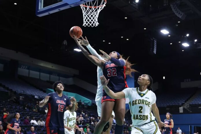 Ole Miss forward Cotie McMahon puts up a layup against George Mason. | Ole Miss Sports