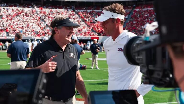 Georgia coach Kirby Smart talks with former Ole Miss coach Lane Kiffin ahead of regular season game. | Ole Miss Athletics