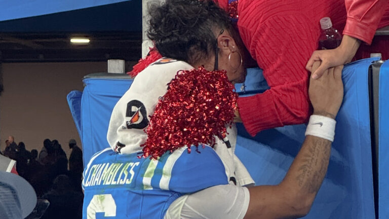 Ole Miss Rebels quarterback Trinidad Chambliss with his mother after a loss to the Miami Hurricanes