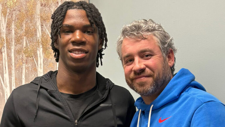 Ole Miss Rebels coach Pete Golding (right) with 2027 recruit Asa Barnes