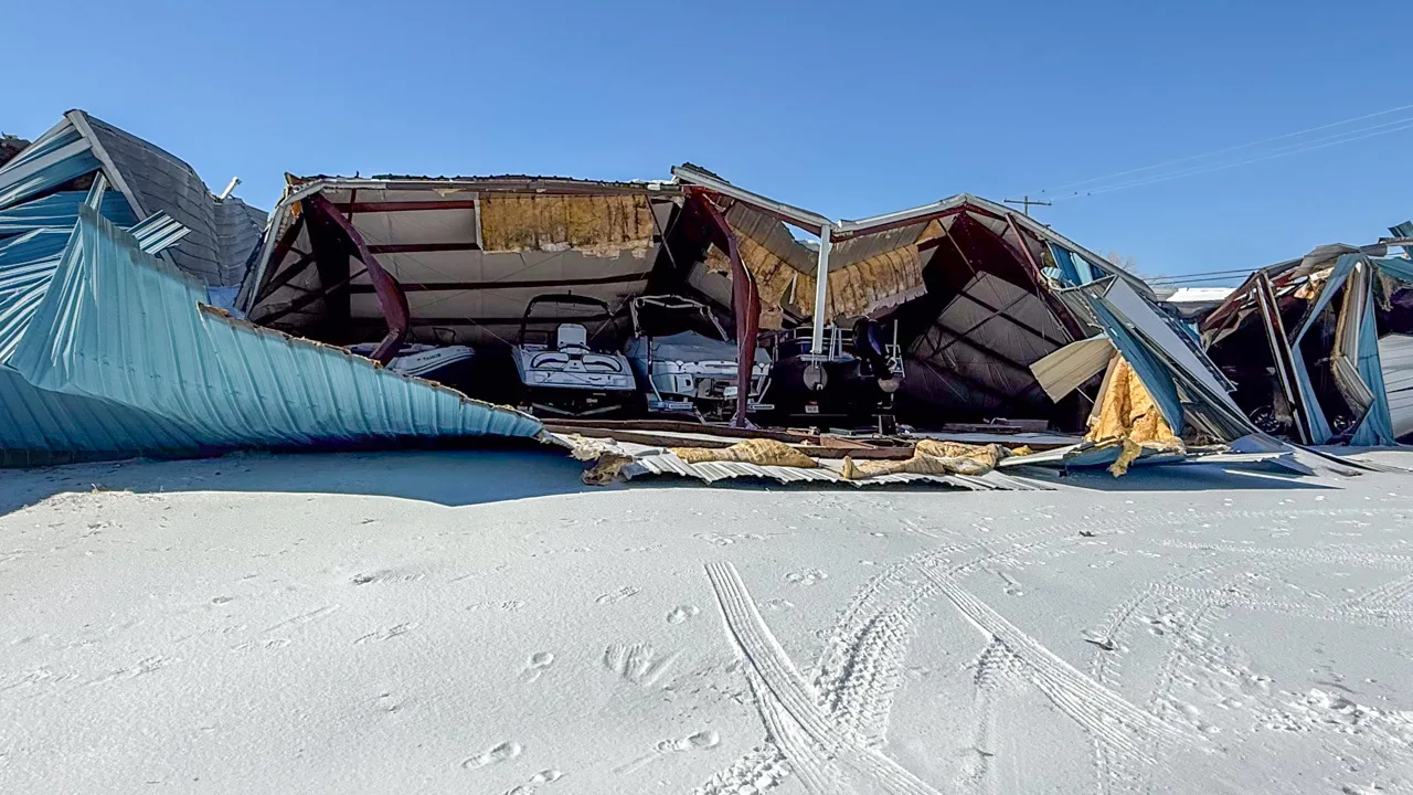 Collapsed roofs on buildings near Batesville, Miss., after ice formed, adding more weight than could be handled in large power outage