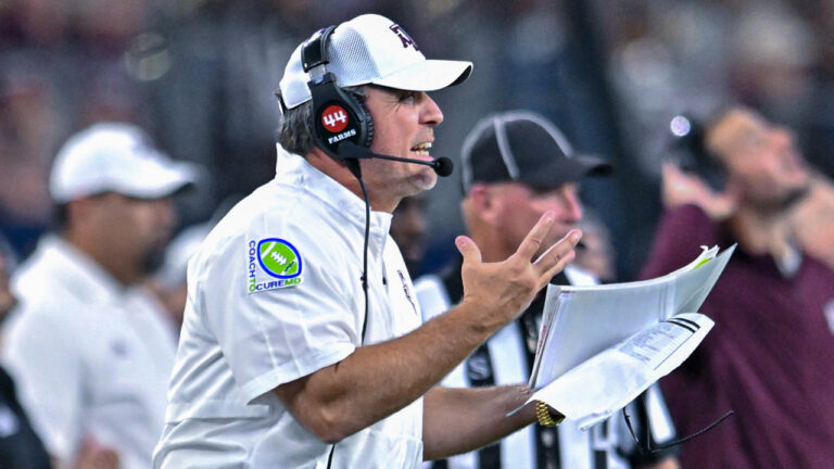 Former Texas A&M Aggies coach Jimbo Fisher on the sidelines in a game at AT&T Stadium
