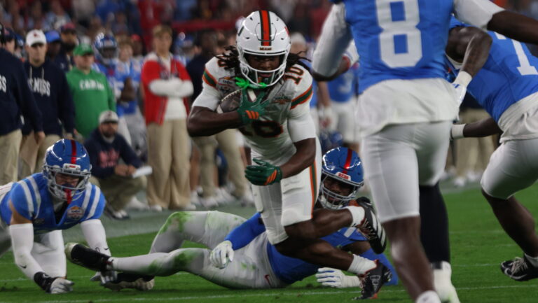 Miami running back Mark Fletcher Jr. runs down field against Ole Miss in a CFP semifinal game. | Ole Miss Athletics