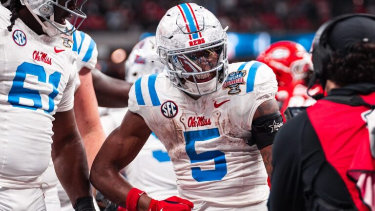 Ole Miss running back Kewan Lacy celebrates a touchdown in the CFP quarterfinal game against Georgia. | Ole Miss Athletics