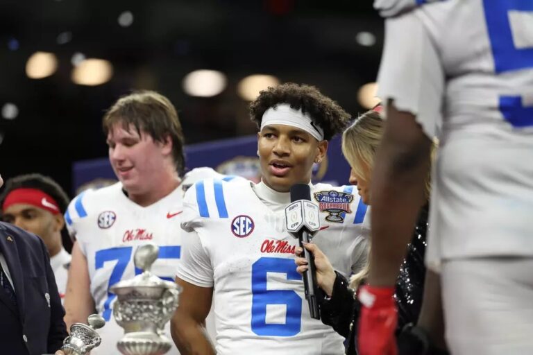 Ole Miss quarterback Trinidad Chambliss talks in the post-game celebration after winning a CFP quarterfinal game. | Ole Miss Athletics