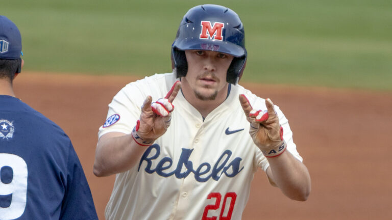 Ole Miss Rebels Collin Reuter after reaching first base against Nevada