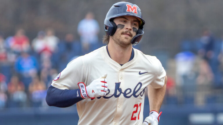 Ole Miss infielder Judd Utermark rounding bases after homer against Nevada