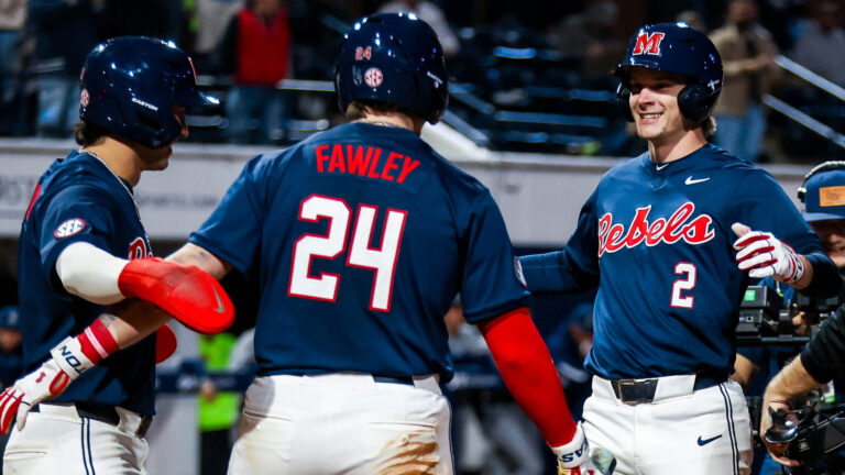 Ole Miss left fielder Brett Moseley arrives at home plate after hitting the first home run of the season for the Rebels against Nevada on Friday night. | Ole Miss Athletics