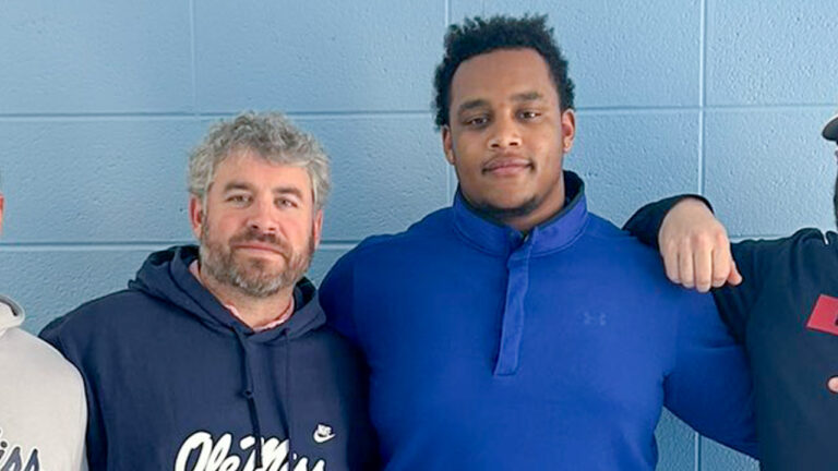 Ole Miss coach Pete Golding and recruit Karlos May