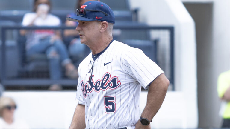 Ole Miss head coach Mike Bianco walks back to the dugout at Swayze Field. | Dylan Cohron, HottyToddy.com Images