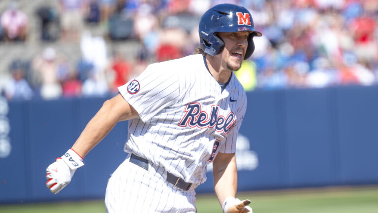 Ole Miss outfielder Brett Moseley smiles as he runs the bases against Kentucky at Swayze Field. | Dylan Cohron, HottyToddy.com Images