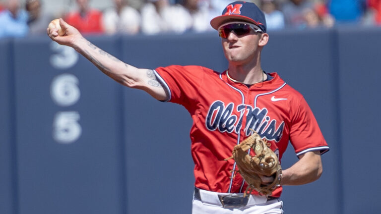 Ole Miss second baseman Dom Decker throws to first during Saturday's game against Mississippi State. | Dylan Cohron, HottyToddy.com Images