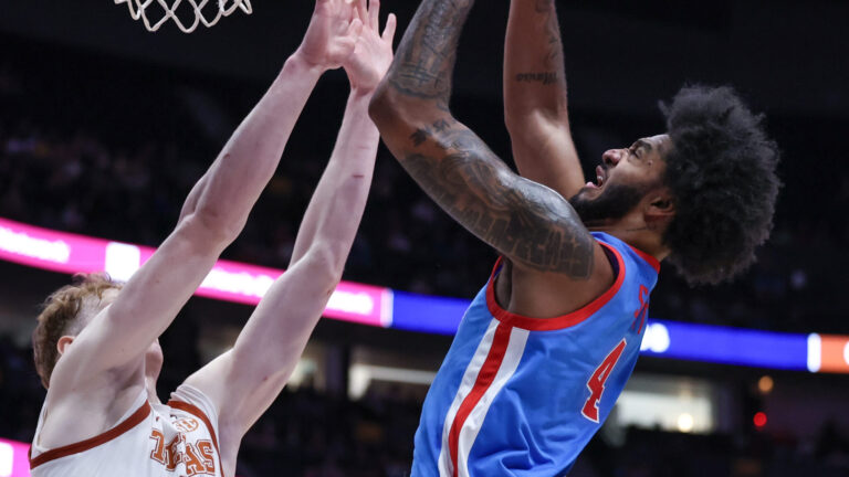 Ole Miss junior James Scott goes up for a layup against Texas in a SEC Tournament game. | Ole Miss Athletics