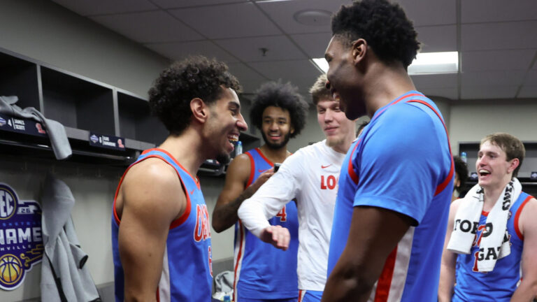 Ole Miss basketball players celebrate a SEC Tournament win against Alabama on Friday night. | Ole Miss Athletics