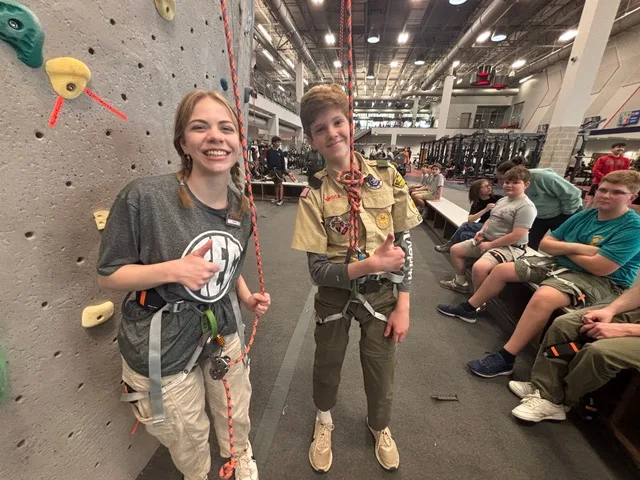 Fin Cole gets harnessed up for the Climbing merit badge at the South Campus Rec Center. 
