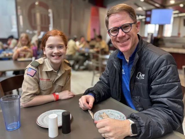Scouts ate on campus at Rebel Market. Here Penny and her local Emmy award winning weatherman father, Matt Laubhan, share some father/daughter time. Matt taught the Weather merit badge for the one-day Merit Badge College.