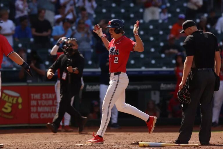 Ole Miss outfielder Brett Moseley reaches home plate after a home run Saturday against Ohio State. | Ole Miss Athletics