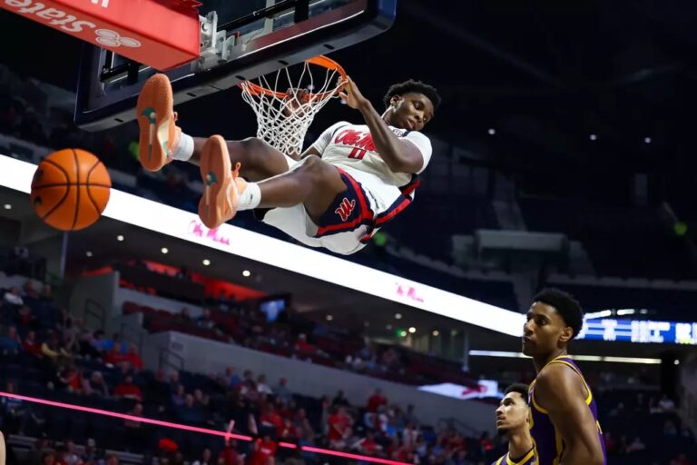 Ole Miss senior Malik Dia dunks against LSU. | Ole Miss Athletics