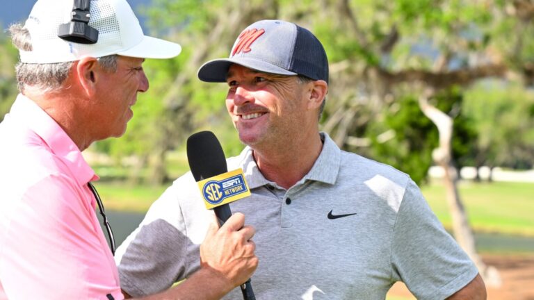 Ole Miss coach Chris Malloy talks to a television reporter after the Rebels secured a spot in the championship match. | Ole Miss Athletics