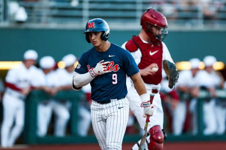 Ole Miss outfielder Hayden Federico walks aback to the Rebels' dugout in a SEC game against Alabama. | Ole Miss Athletics