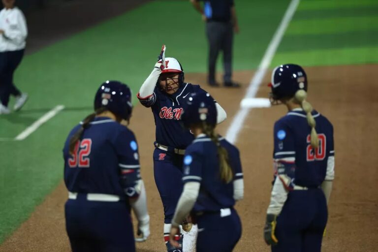 Ole Miss' Persy Llamas celebrates a home run against Boston University. | Ole Miss Athletics