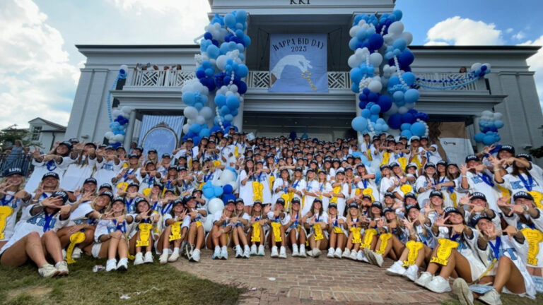 Sorority members of Kappa Kappa Gamma celebrate their newest members after Bid Day. | Ryan Leider, HottyToddy.com Images