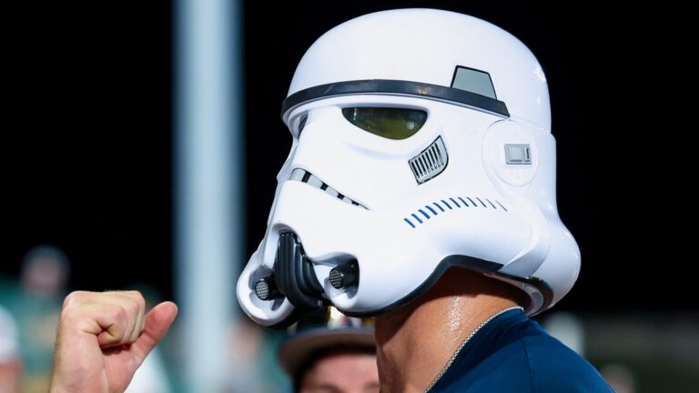 Ole Miss third baseman Judd Utermark dons the Rebels' stormtrooper helmet after a game. | Ole Miss Athletics